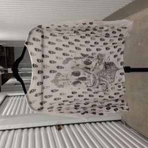 This awesome skull dolman sleeved sheerish top.